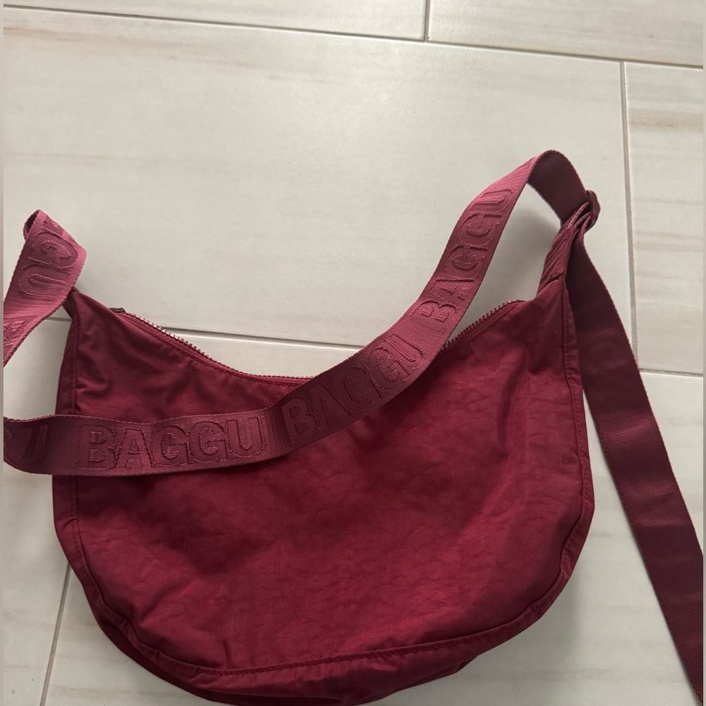 Baggu nylon crescent bag in a ‘wine’ burgundy color
